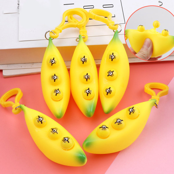 Søt Ekstrudering Banan Stress Relief Toy Nøkkelring Ekstrudering Nie