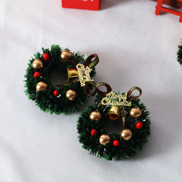 1 kpl Miniatyyri seppele-nukketalon joulukuusenkoristenukke