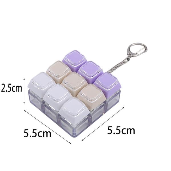 9 näppäimen mekaaninen näppäimistön avaimenperä e Luova leluavainriipus 1Pcs random