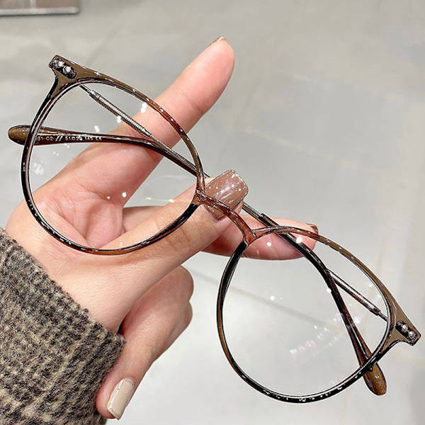 Säteilyä estävät silmälasit Pyöreät metallirunkoiset silmälasit naisille Transparent gray