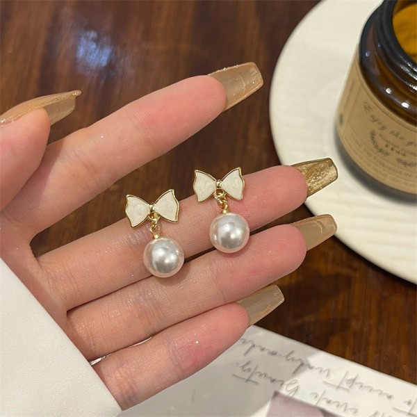 Mote kvinners enkle utsøkte øredobber Bow Knot Shell Pearl