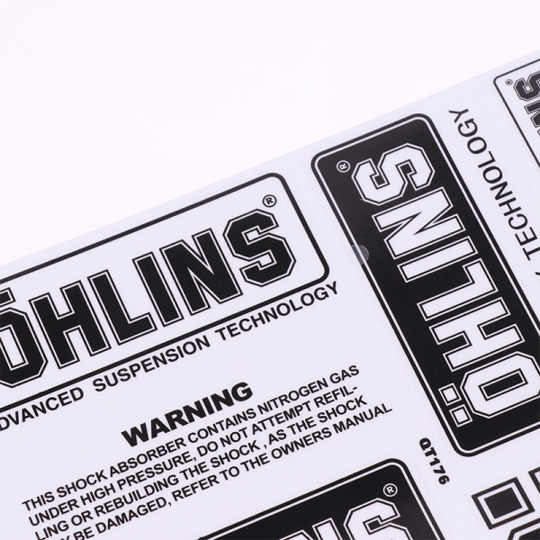 Pari läpinäkyviä OHLINS-postimerkkejä koristetarroja black