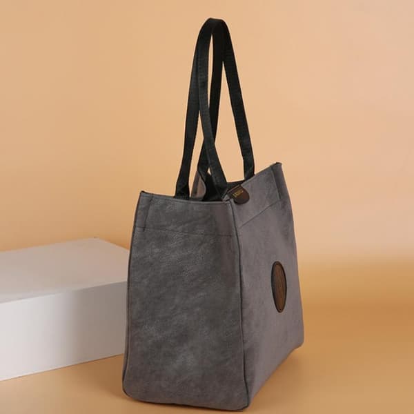 Afslappet alsidig mulepose med stor kapacitet til rejser, pendling og kontor Dark brown