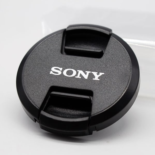 SLR-kameran linssin cover , joka sopii 40,5-82 mm pölynestolle 52mm