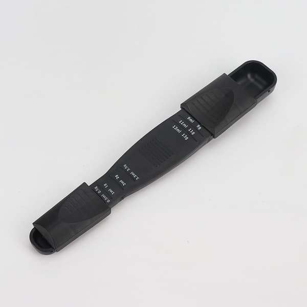 Justerbar måleske med dobbelt ende, gram, milliliter, teske