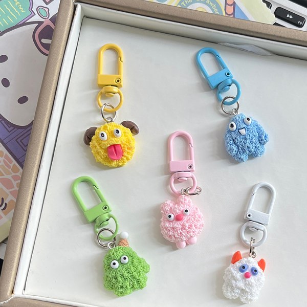 Cartoon e Little Monsters nøkkelring Resin Kawaii Charm Bag Penda Blue