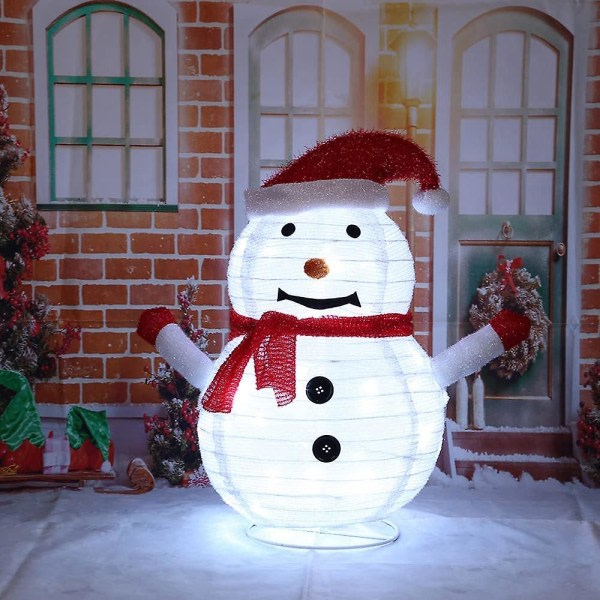 Julljusfigurer: LED-tomte, snøgubbe og pingvinfigurer
