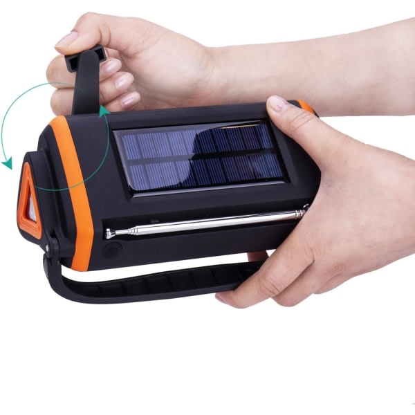 Sää-käsikammen aurinkovoimalla toimiva kannettava radiohätäradio, LED-taskulamppu AUX ja SOS-laitteet ulkokäyttöön
