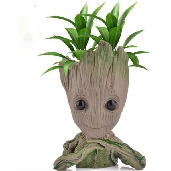 Groot kukkaruukku sarjakuvahahmo Puutarharuukku kukkaruukku reikäkynätelineellä lahjoja lapsille