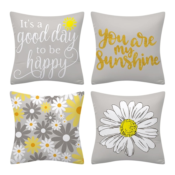 Kukkaiset keltaiset ja harmaat tyynynpäälliset sohvalle, kaksipuoliset