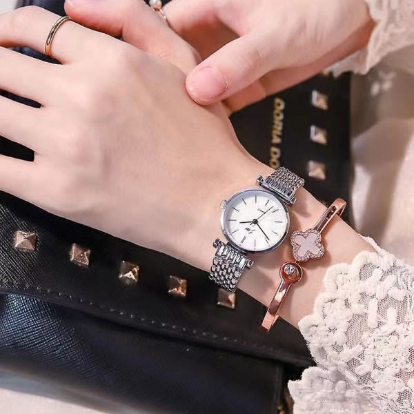 Mode ins stil klassiska watch kvinnors casual elektroniska kvartsstål armband watch Gold strap white plate