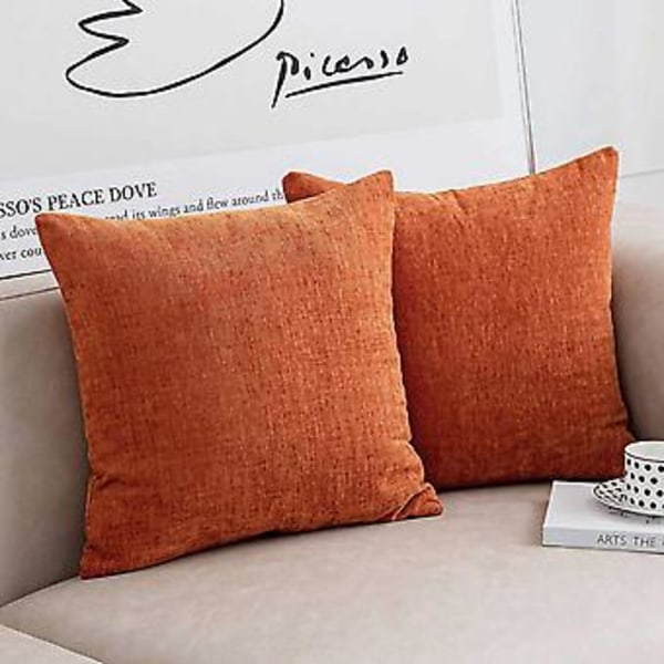 Poltetun oranssin väriset päälliset 45x45 cm, 2 kpl