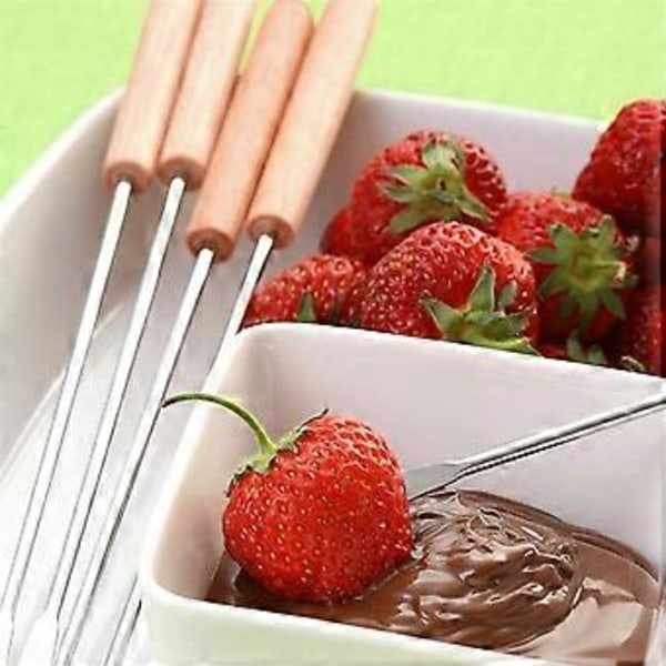 Fonduehaarukat, juustofondue-tikkuja puisella kahvalla, lämmönkestäviä suklaalähteeseen ja vaahtokarkkien paahtamiseen