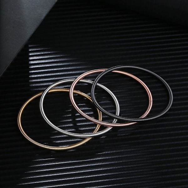 Metal Retractable Rustfrit Stålfjeder Armbånd Stackable Coil Guitar Streng