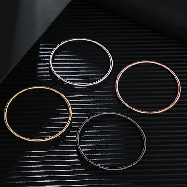 Metal Retractable Rustfrit Stålfjeder Armbånd Stackable Coil Guitar Streng