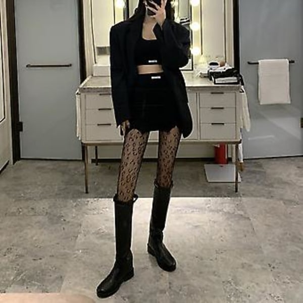 Svarta Sexiga Retro Leopard Fisknätsstrumpbyxor Dam Mode Fisknät Tights Hål Tights Strumpbyxor