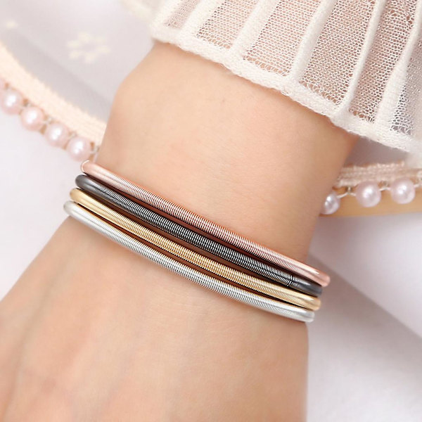 Metal Retractable Rustfrit Stålfjeder Armbånd Stackable Coil Guitar Streng