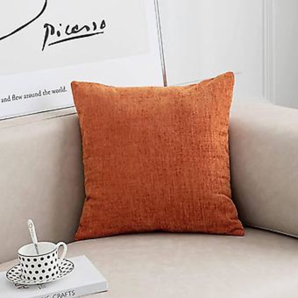 Poltetun oranssin väriset päälliset 45x45 cm, 2 kpl