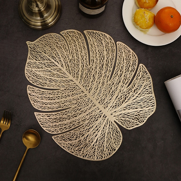 Set med 6 st bordsunderlägg ihåliga blad bordsunderlägg tvättbar bordsunderlägg dekorativa halkfria plastbordsunderlägg för köksbord (guld)