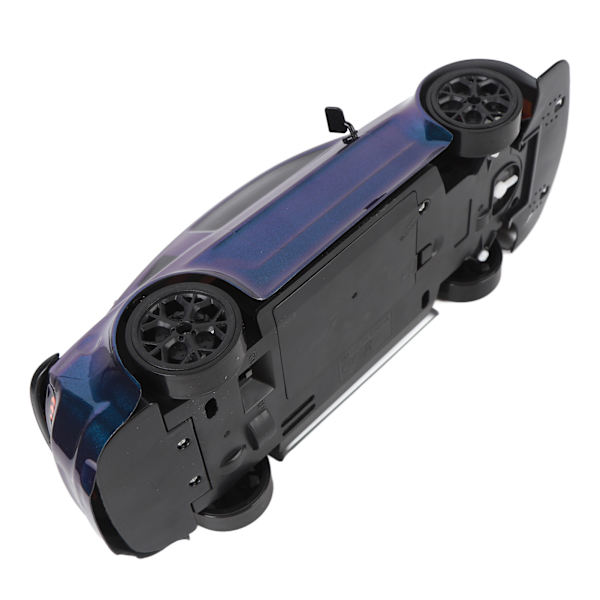 1/14 RC Driftbil Anti Interferens 2.4G Fjärrkontroll 4WD RC Racing Bilmodell med Frontljus 2 Set Hjul Singelbatteri