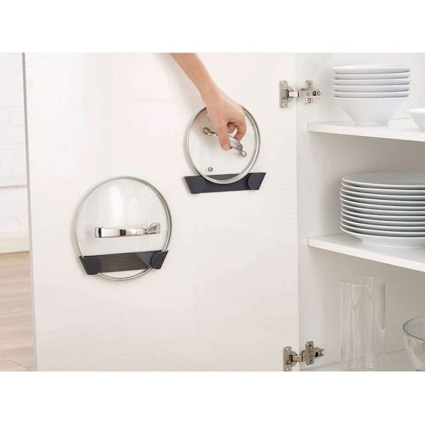 CupboardStore - Set med 4 lockhållare för grytor och stekpannor Självhäftande väggmontering, lämplig för lock upp till 24 cm, självhäftande tejp ingår