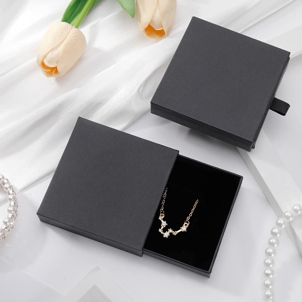 Smyckeskrin i kartong för armband och halsband, stilren förpackningslösning med låddesign, klassisk svart färg