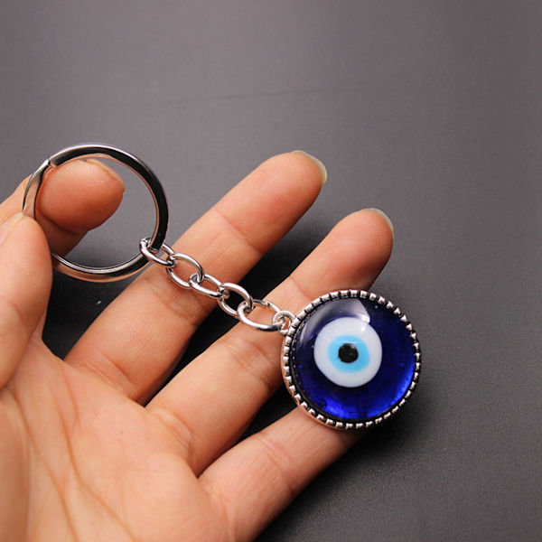 2 st onda öga nyckelring hållbar legering färgad glasyr amulett för lycka skydd