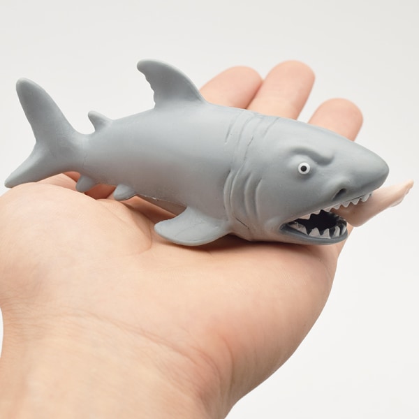 2kpl Luovia stressiä vähentäviä leluja puristavia leluja uppoava hai surffausjaloilla pop-up dekompressio lelut lusikkatemppu lahja