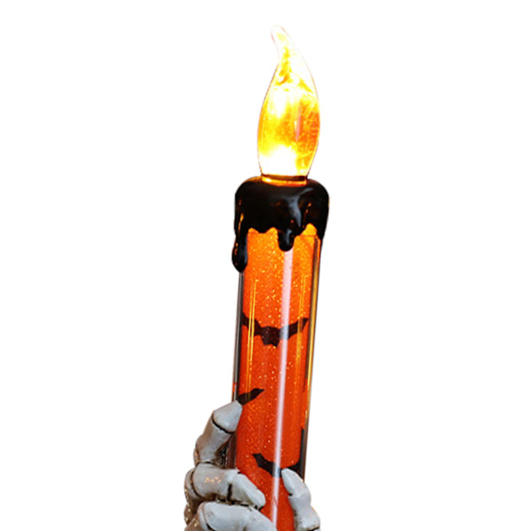 Halloween-kallokynttilänpidike luurankokädellä ja liekittömällä haamukynnellä - Oranssi juhlakoriste baareihin ja tapahtumiin