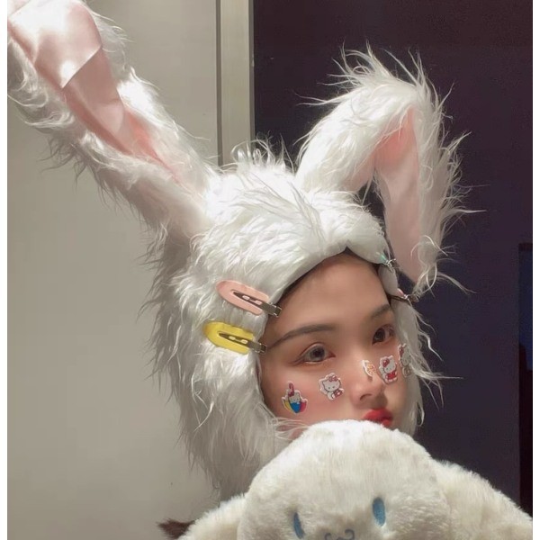 Sød pige hjerte plys kanin lange øre hovedbeklædning Foto Udfør