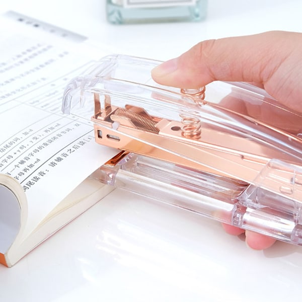 Håndholdt stiftemaskin i roségull-akryl - Minimalistisk design, komfortabelt grep, effektiv for bruk på kontoret og skolen