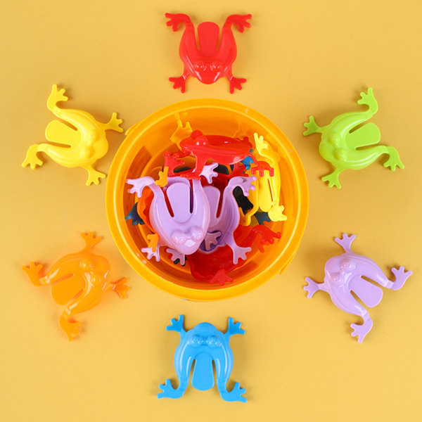 12ST Färgglada groda hoppa leksaker Fingerpressande hoppande grodor med hink Barn studsande set Presentförpackning