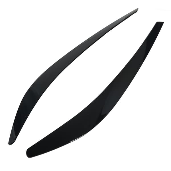 2 stk. Øyelokktrim for frontlykter, blank svart, for Commodore VF I II 2013-2017