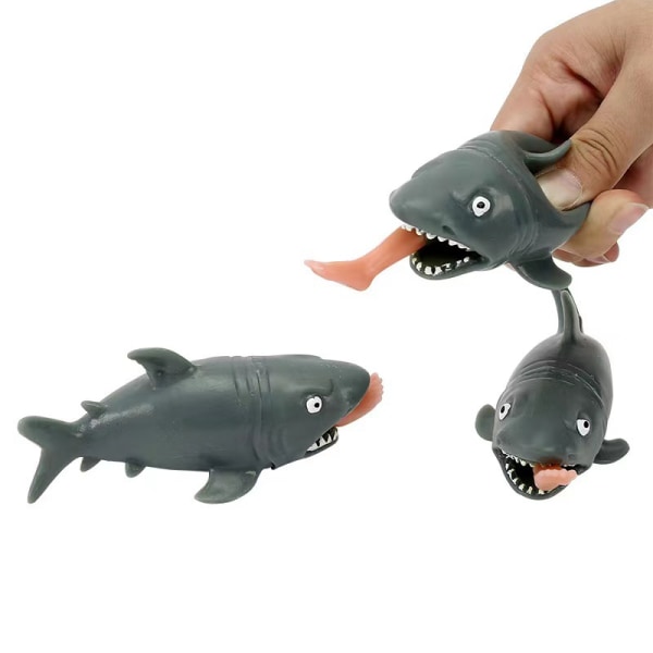 2kpl Luovia stressiä vähentäviä leluja puristavia leluja uppoava hai surffausjaloilla pop-up dekompressio lelut lusikkatemppu lahja