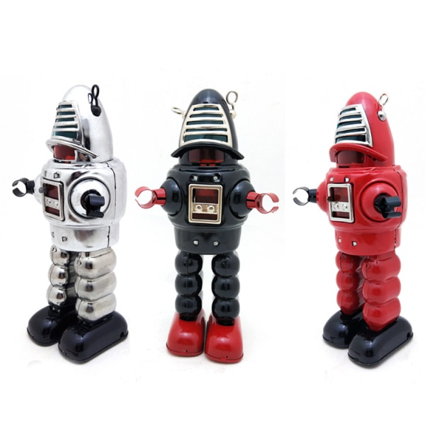 Vuxna fäktrobotar samlar rekvisita för leksaksfotografering