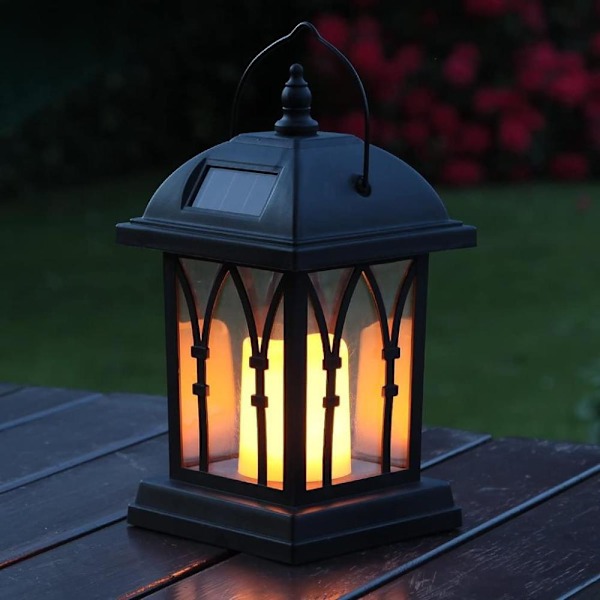 Black solar lantern with LED candle and deceptively realistic flickering effect