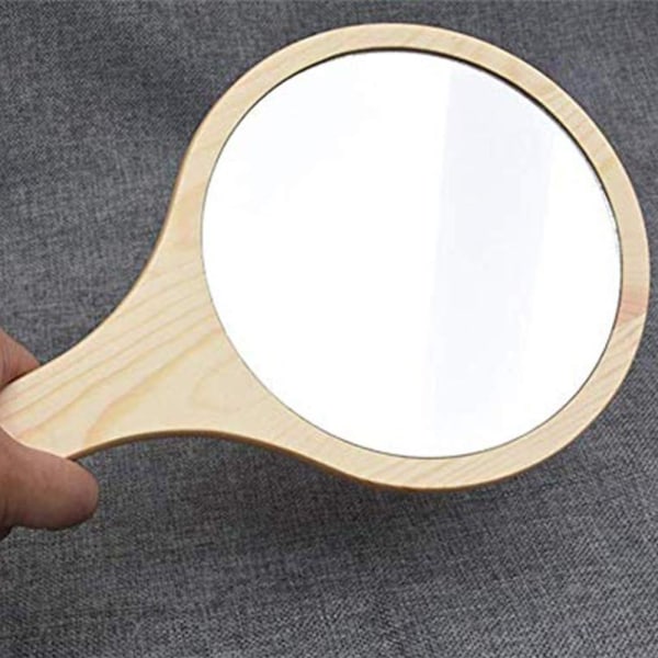 Frisør håndspejl cirkulært med træhåndtag rundt træ