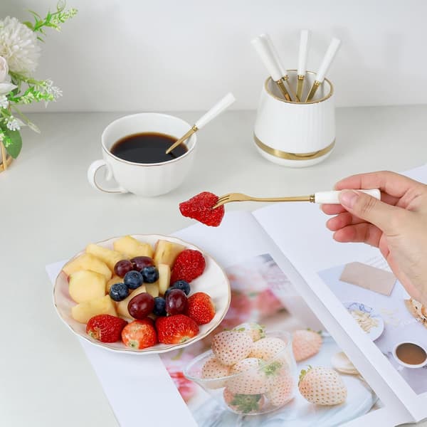 Kaffeskedset (inklusive keramisk skedhållare)