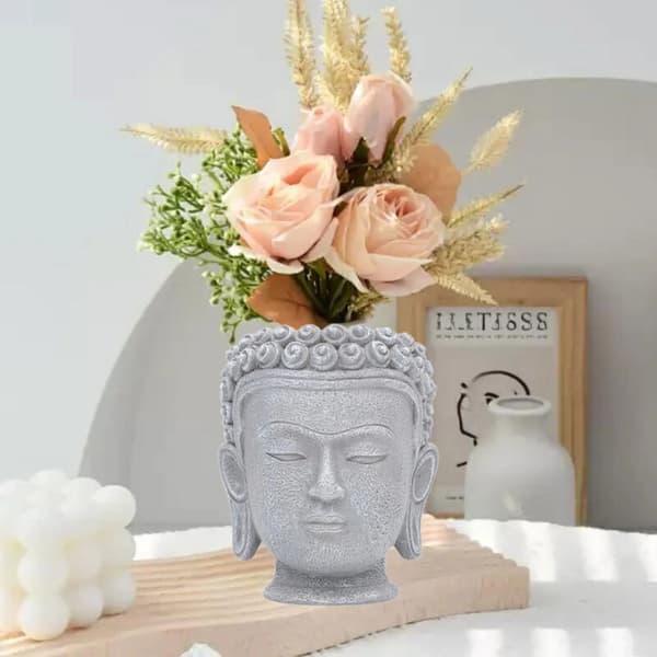 Blomsterpotte formet som et Buddha-hode