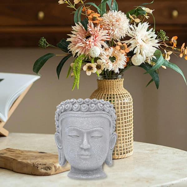 Blomsterpotte formet som et Buddha-hode
