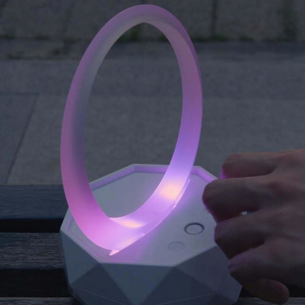 Kompakt Bluetooth-högtalare med färgglada ljuseffekter