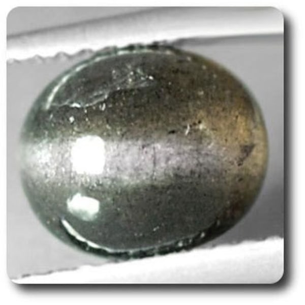 Sten og mineraler. 2,47 cts CAT'S EYE SCAPOLITE Tanzania, Afrika.