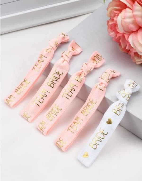 Möhippa / Elastiska Armband Möhippa Bröllop Set med 9 delar > 8x Team Bride (rosa) + 1x Bride Armband (vitt)