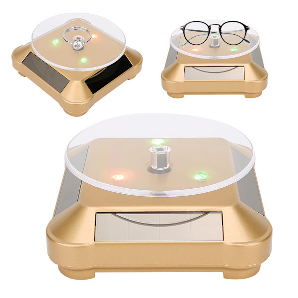 Solcellsdriven LED Elektrisk Roterande Turntable Displayställ för Smycken Telefon Guld med Ljus