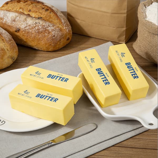Smørbar Form Sakte Stigende Klemmeleke for Sensorisk Håndlek Medium 21 cm Butter Stick