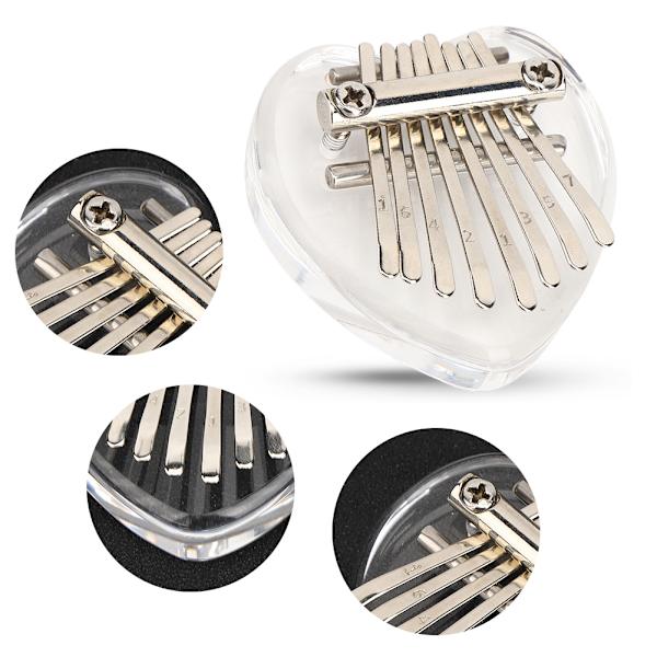 Tommelpiano 8 tangenter Mini bærbart akrylmateriale Dekorasjonsgave Musikkinstrument (hjerteformet krystall)