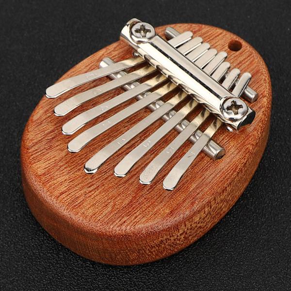 Tommelfingerklaver 8 tangenter Mini bærbart akrylmateriale Dekorationsgave MusikinstrumentOval råtræ