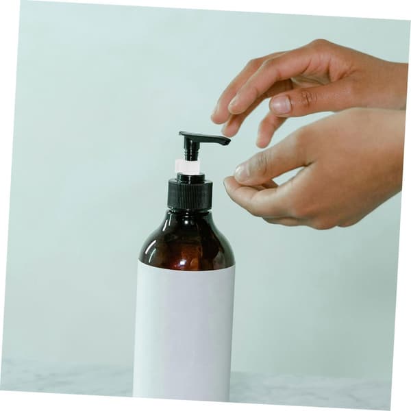 100 st vita plastlotionflaskpumpklämmor läckagesäkra snäppfästen
