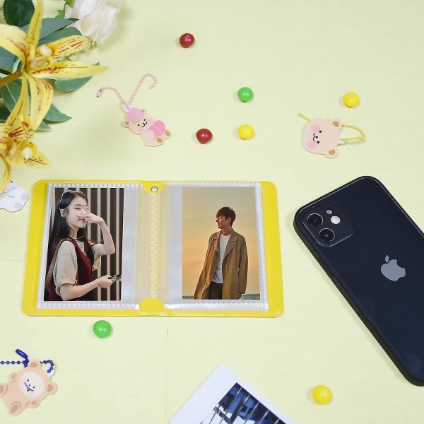 Vaaleanpunainen Kpop 3 tuuman minivalokuva-albumi, jossa ontto sydämenmuotoinen korttipidike ja 40 taskua