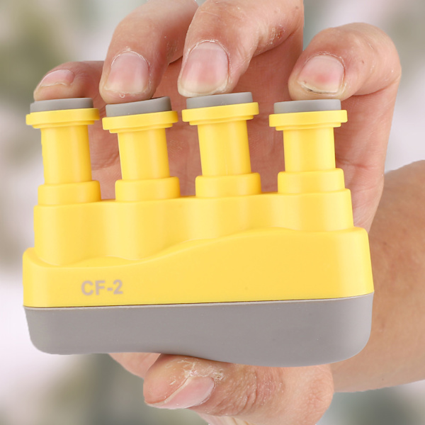 Barn Variable Hand Finger Styrke Tension Exerciser Grip Trainer for pianogitar (gul)